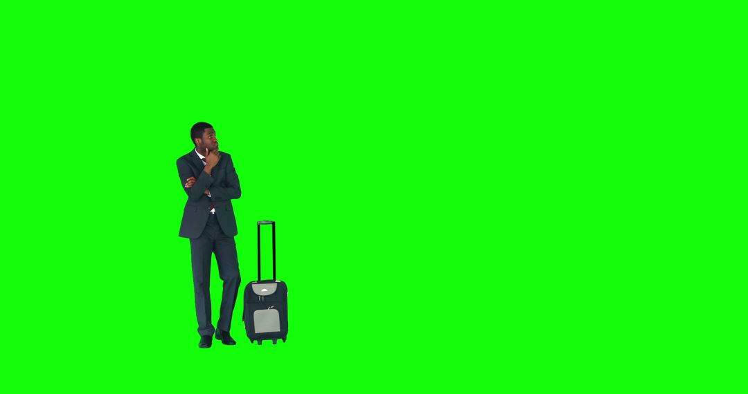 Businessman With Travel Luggage on Green Background Ready for Journey - Free Images, Stock Photos and Pictures on Pikwizard.com