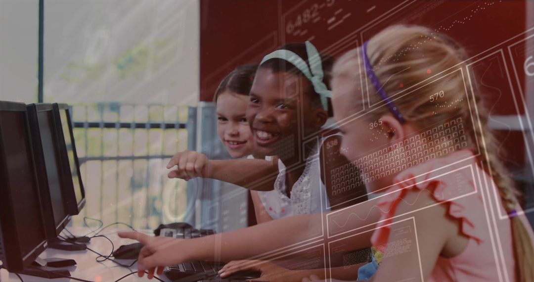 Girls Collaborating in School Computer Lab Using Technology