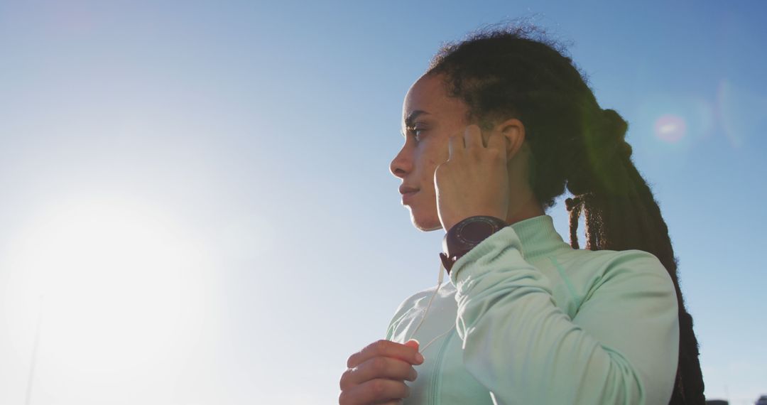 Focused athlete preparing for a run at sunrise - Free Images, Stock Photos and Pictures on Pikwizard.com