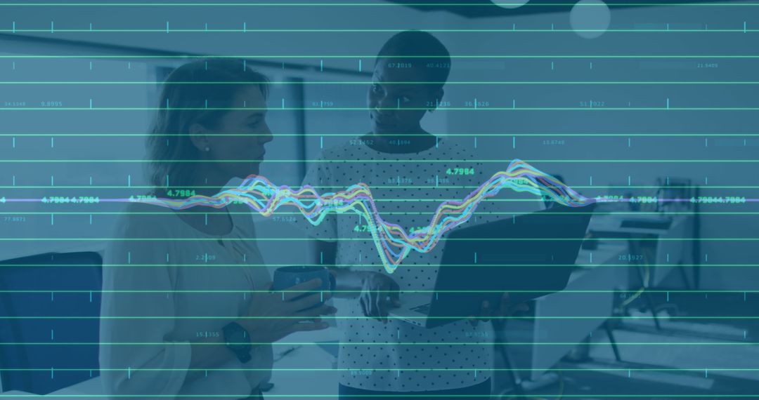 Business Team Analyzing Financial Data on Laptop Screen in Modern Office