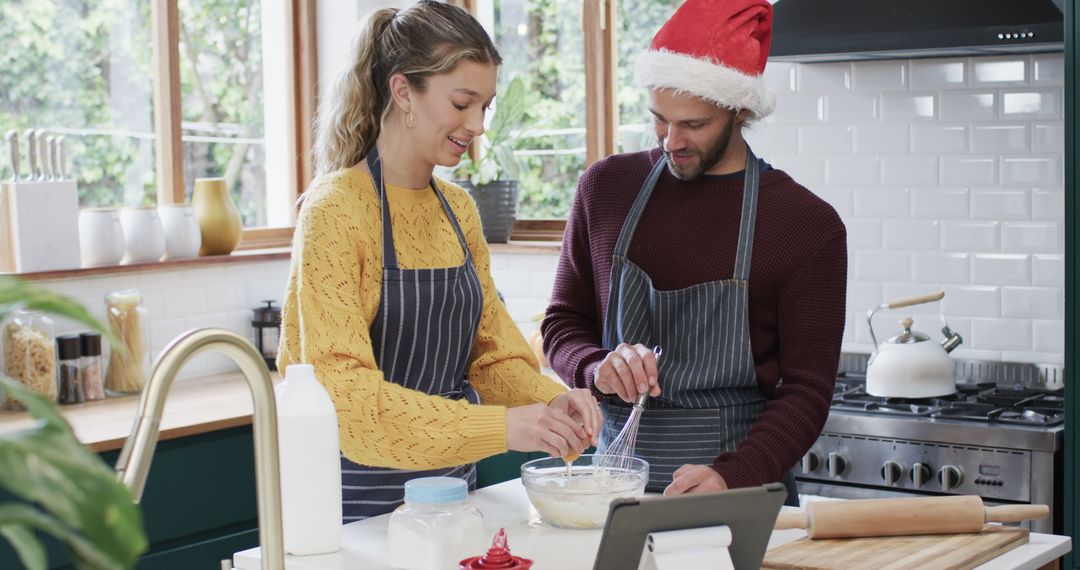 Couple Preparing Holiday Meal in Modern Kitchen with Digital Assistant - Free Images, Stock Photos and Pictures on Pikwizard.com