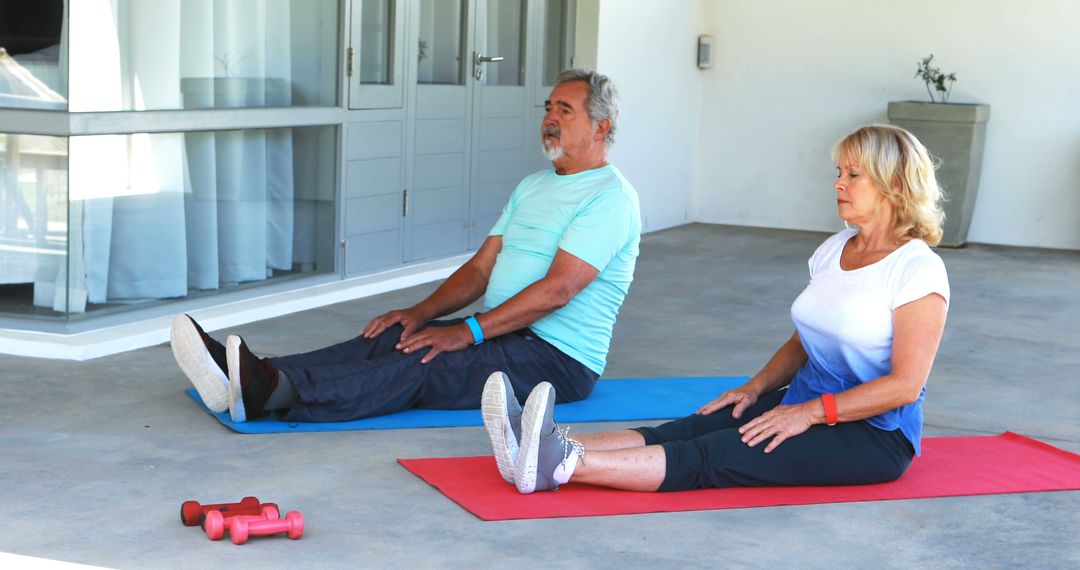 Senior Couple Engaging in Outdoor Yoga Session - Free Images, Stock Photos and Pictures on Pikwizard.com