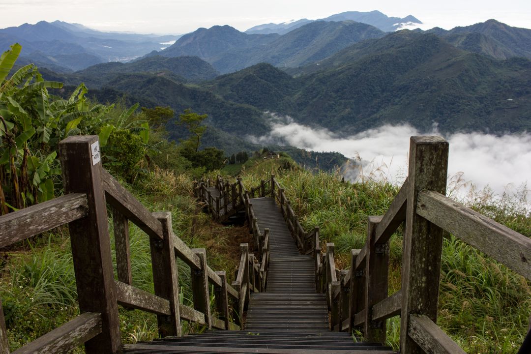 Wooden Staircase Overlooking Misty Mountain Range at Dawn - Free Images, Stock Photos and Pictures on Pikwizard.com