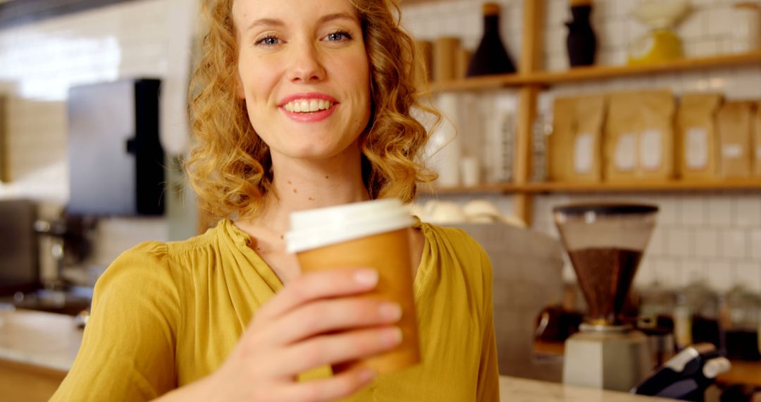 Friendly Barista Serving Coffee in Cozy Café - Free Images, Stock Photos and Pictures on Pikwizard.com