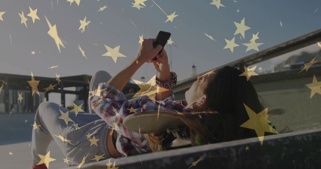 Young Woman Relaxing at Skate Park Using Smartphone, Refreshing Urban Break
