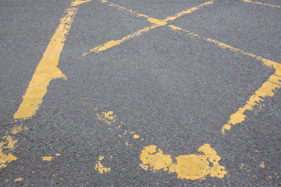 Worn Yellow Road Markings on Asphalt - Free Images, Stock Photos and Pictures on Pikwizard.com