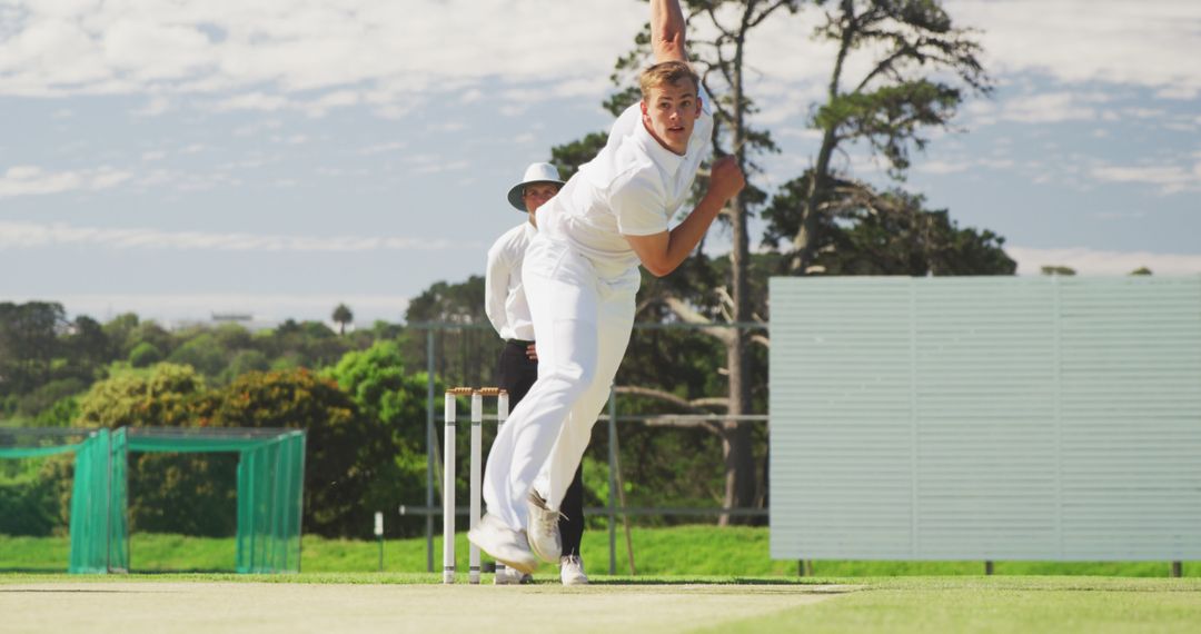 Cricketer delivering fast ball on professional pitch during match - Free Images, Stock Photos and Pictures on Pikwizard.com