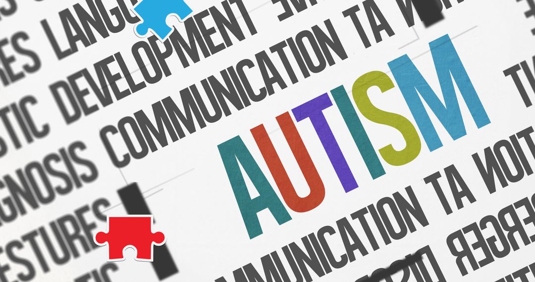 Autism Awareness Concept with Puzzles and Keywords