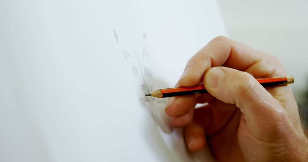 Close-Up of Hand Sketching with Pencil on White Paper - Free Images, Stock Photos and Pictures on Pikwizard.com