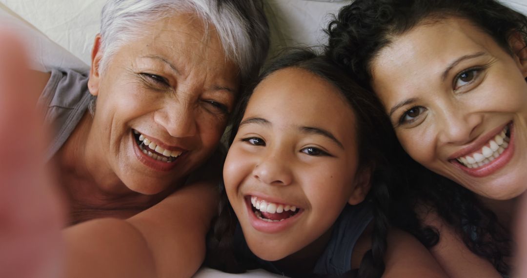 Three Generations of Women Smiling Together - Free Images, Stock Photos and Pictures on Pikwizard.com