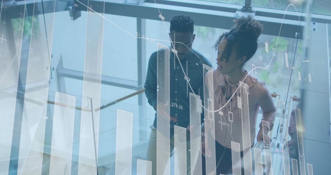 Business Team Analyzing Digital Financial Data in Office Space