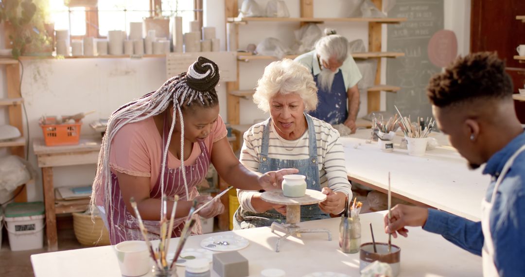 Diverse Group Having Fun in Pottery Class - Free Images, Stock Photos and Pictures on Pikwizard.com