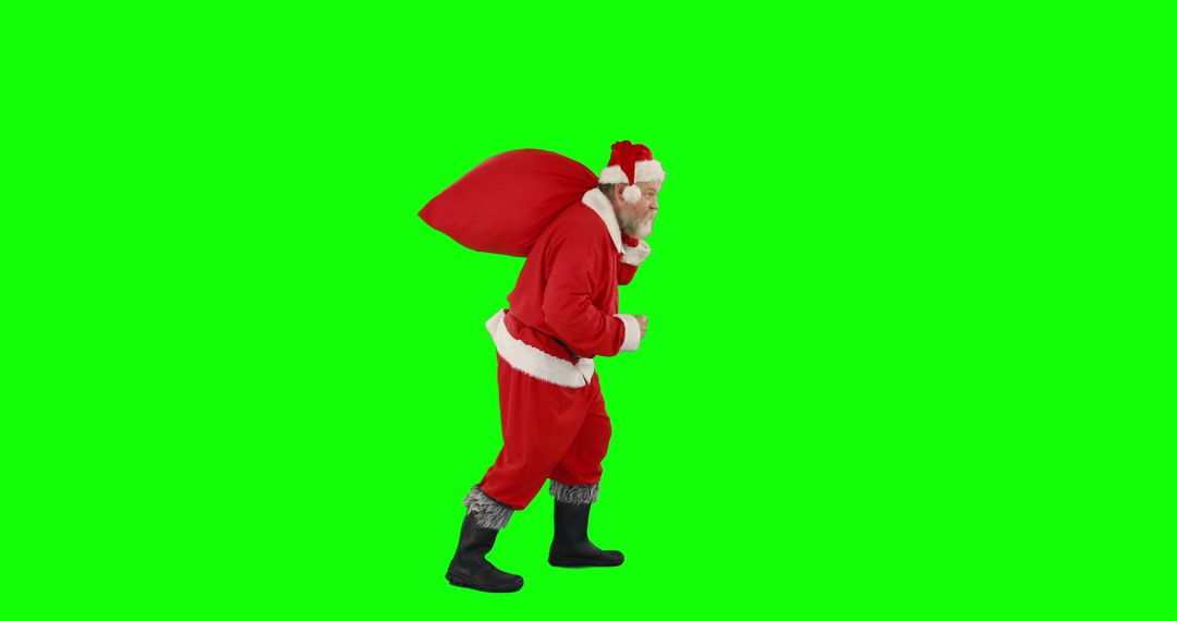 Santa Claus Carrying Heavy Red Bag on Green Background - Free Images, Stock Photos and Pictures on Pikwizard.com