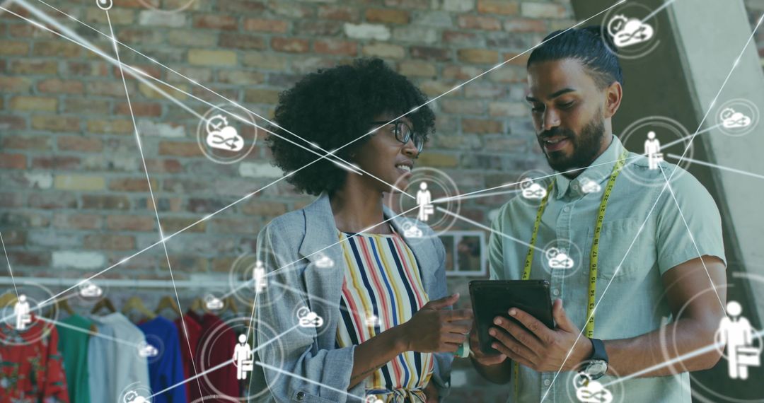 Diverse Colleagues Discussing Network Insights with Digital Tablet