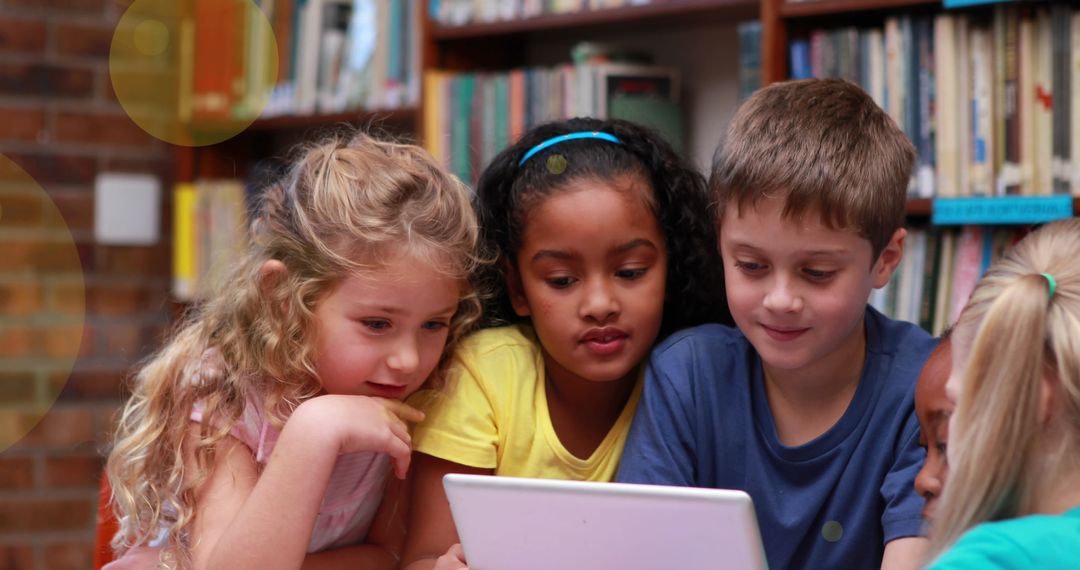 Diverse Group of Students Engaged with Tablet in Classroom Setting
