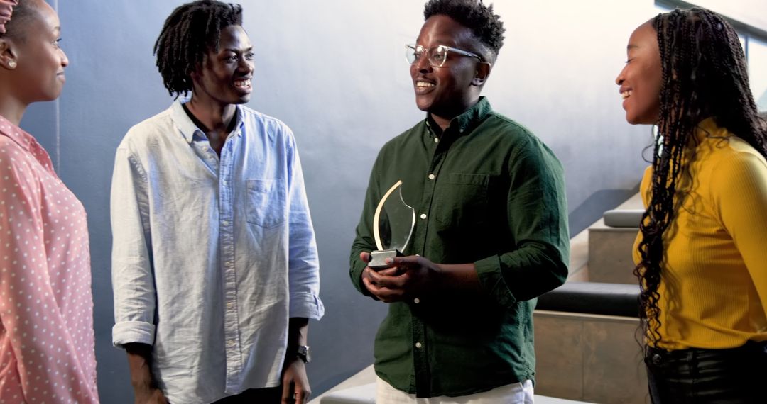 Colleagues Collaborating on Stairs in Modern Office Environment