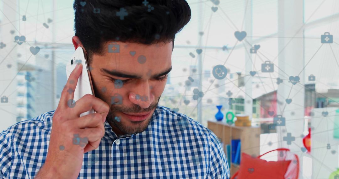 Connected Health Icons Overlay on Man Using Phone