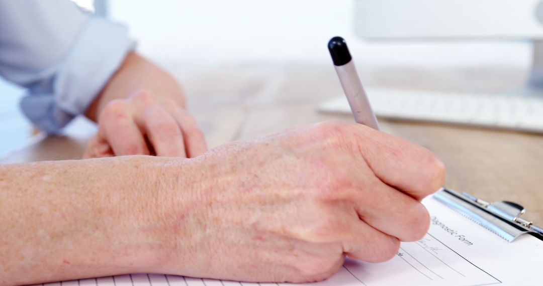 Hand Writing on Paper with Pen on Wooden Desk - Free Images, Stock Photos and Pictures on Pikwizard.com