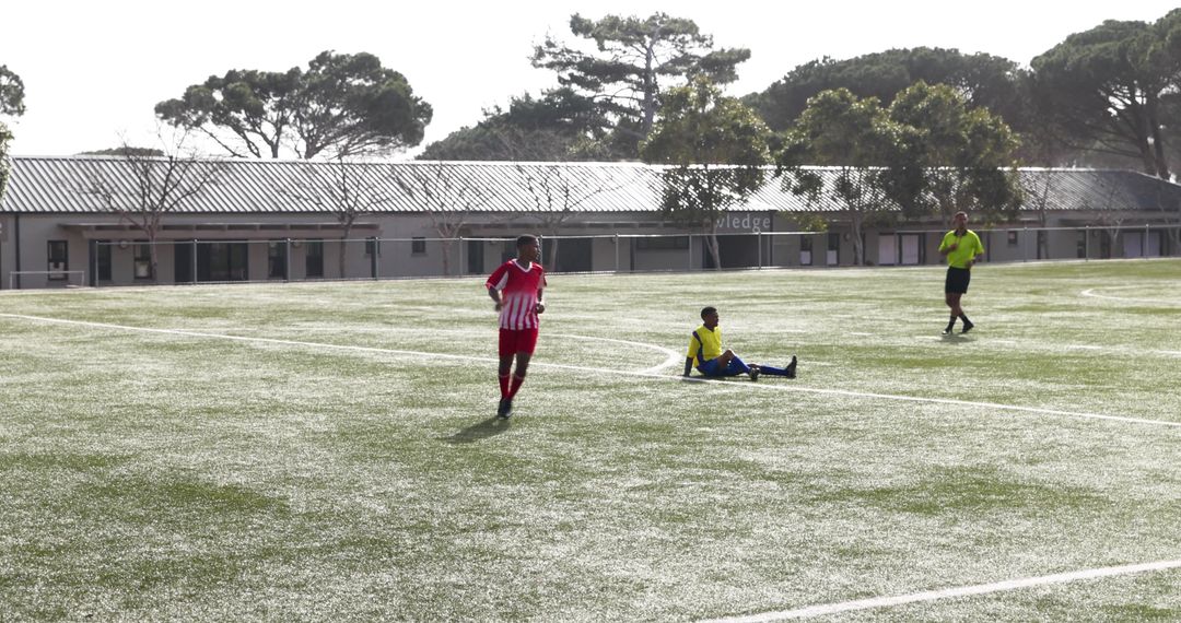School Soccer Game on Sunny Day with Enthusiastic Players