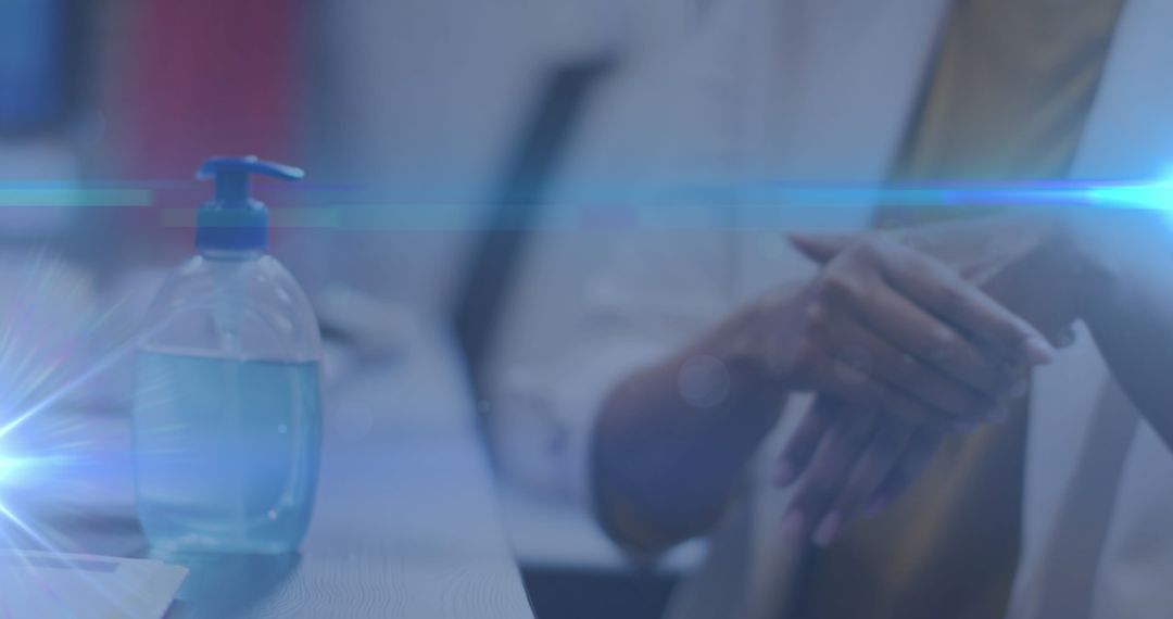 Office Worker Sanitizing Hands Health Safety Concept