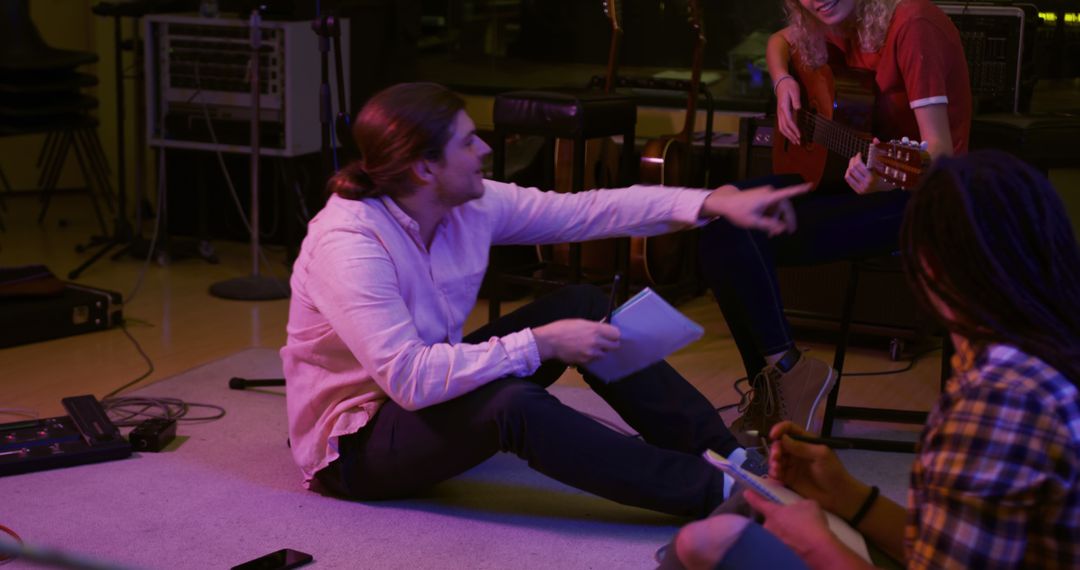 Music Collaboration During Band Writing Session in Recording Studio