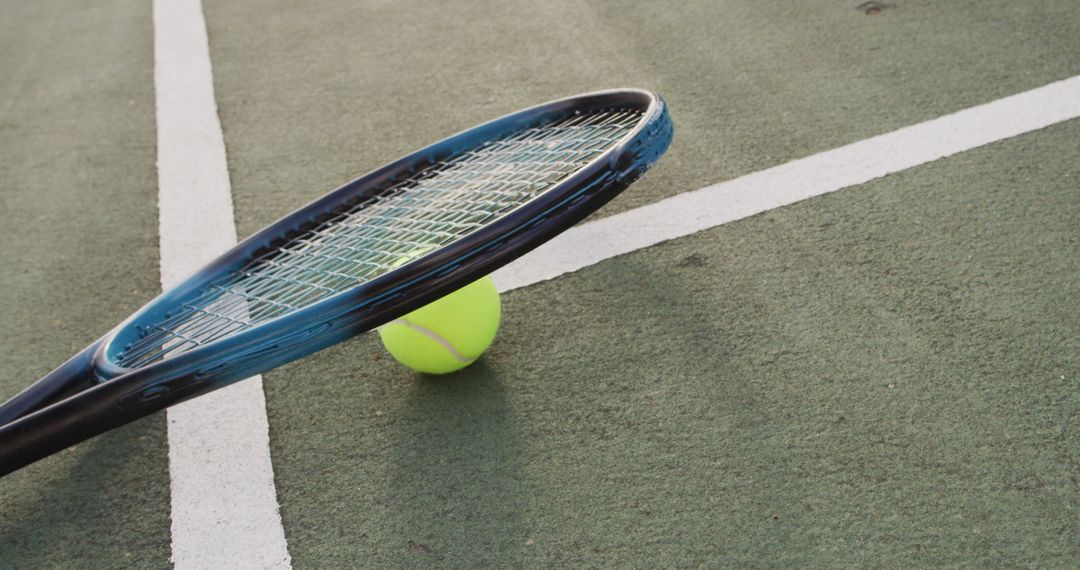 Tennis Racket and Ball on Court Surface - Free Images, Stock Photos and Pictures on Pikwizard.com