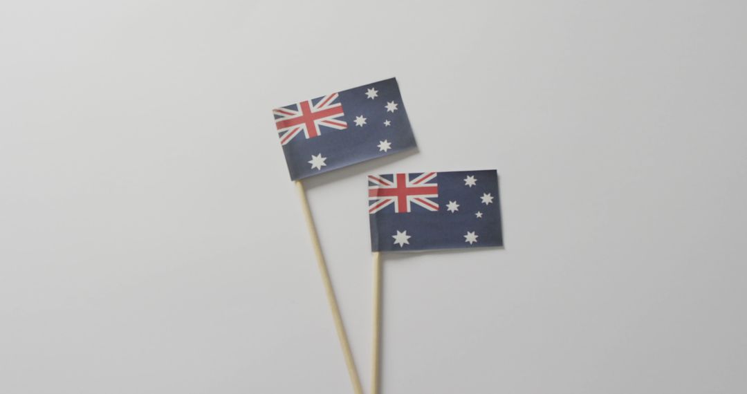 Image of flags of australia lying on white background - Free Images, Stock Photos and Pictures on Pikwizard.com