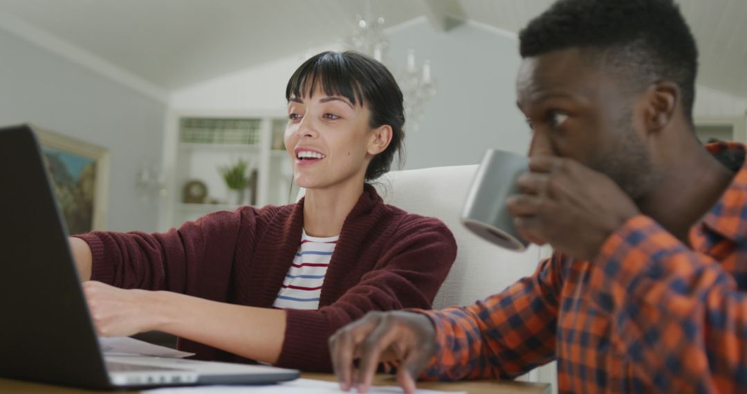 Collaborative Couple Working on Innovating Ideas at Home