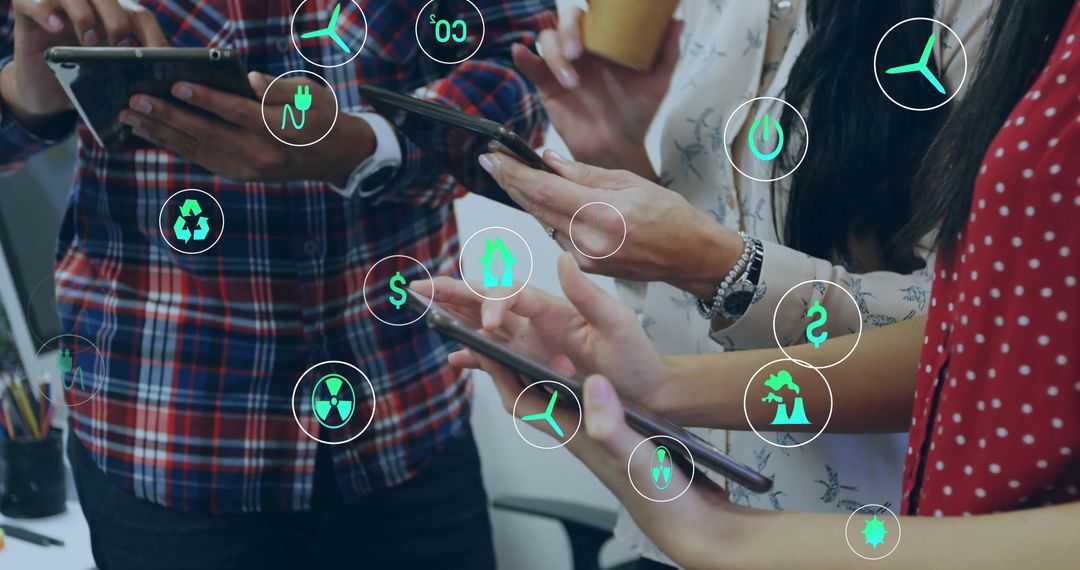 Diverse Team Using Tablets with Eco Icons Overlay