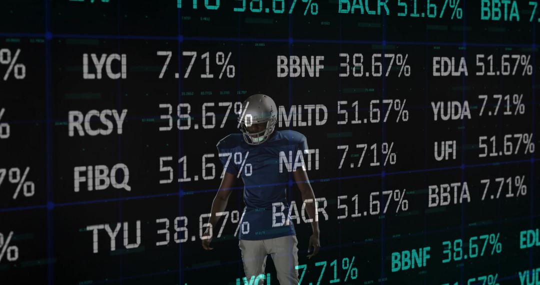 Black football player wearing reflective helmet and navy jersey with finance data overlay