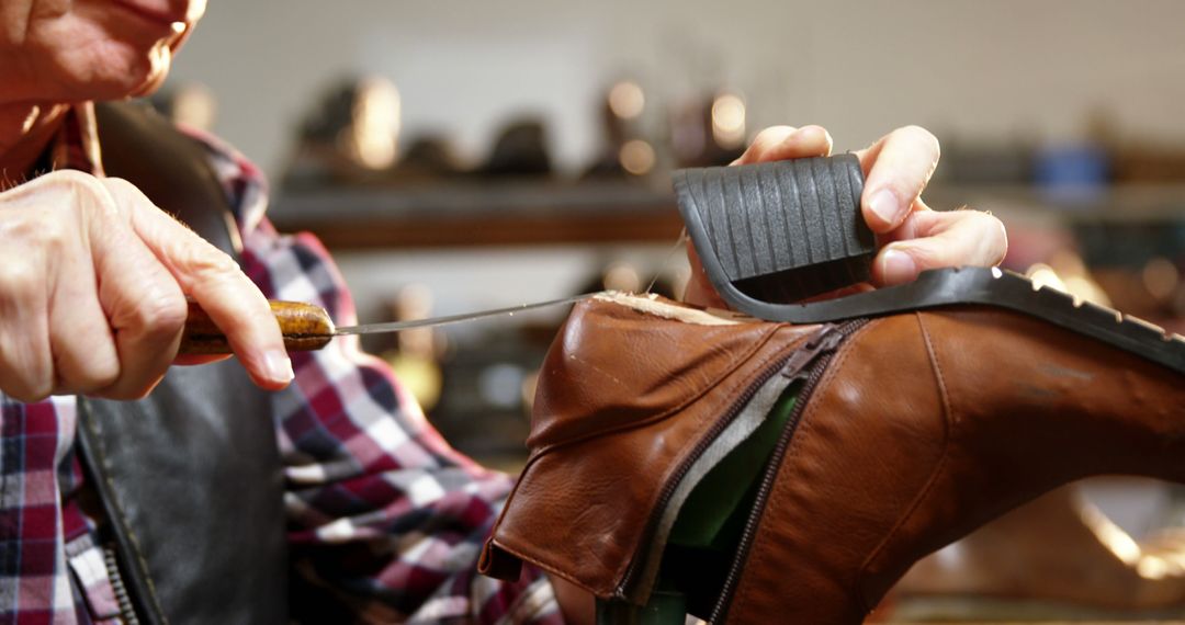 Skilled Cobbler Repairing Leather Shoe With Hand Tools - Free Images, Stock Photos and Pictures on Pikwizard.com