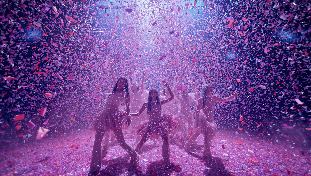 Vibrant Dance Performance on Stage with Falling Confetti