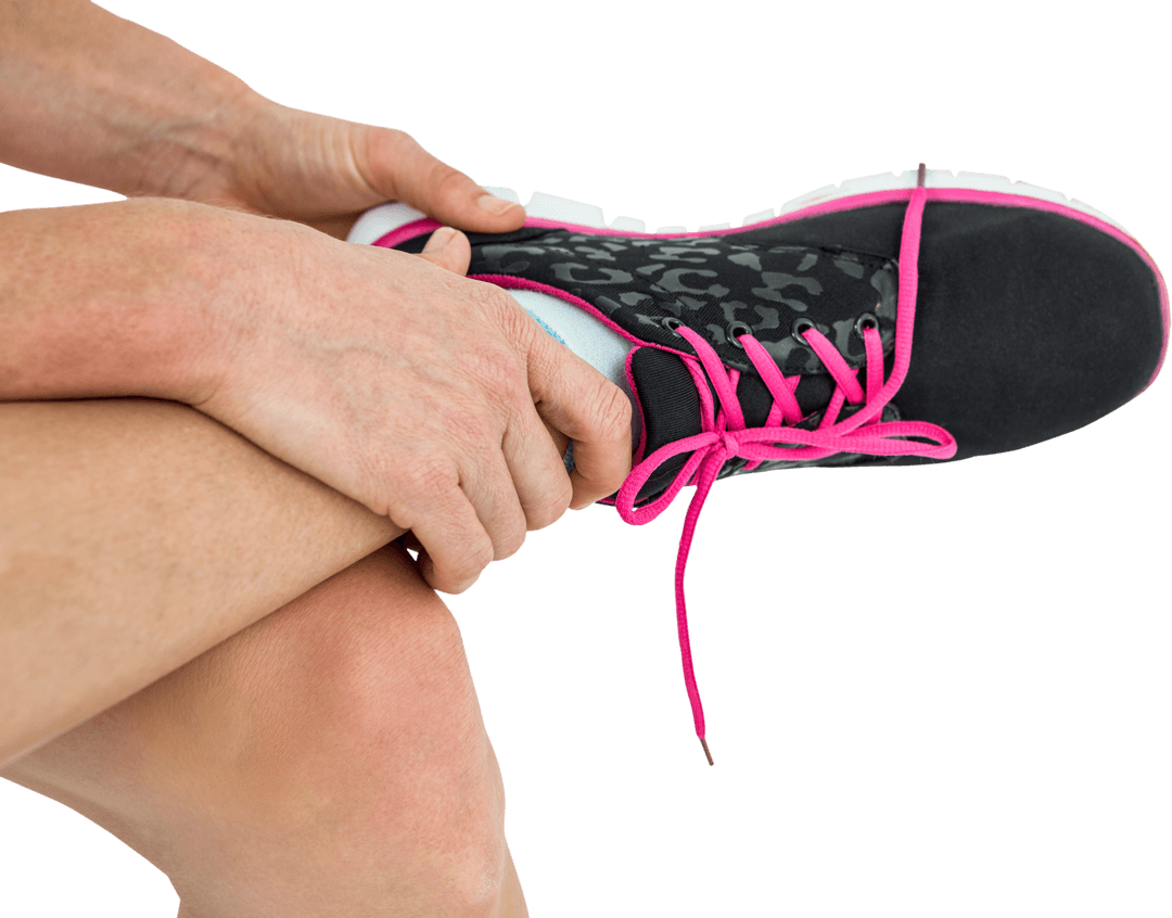 Hands Tying Laces on Leopard Print Transparent Trainer Shoe