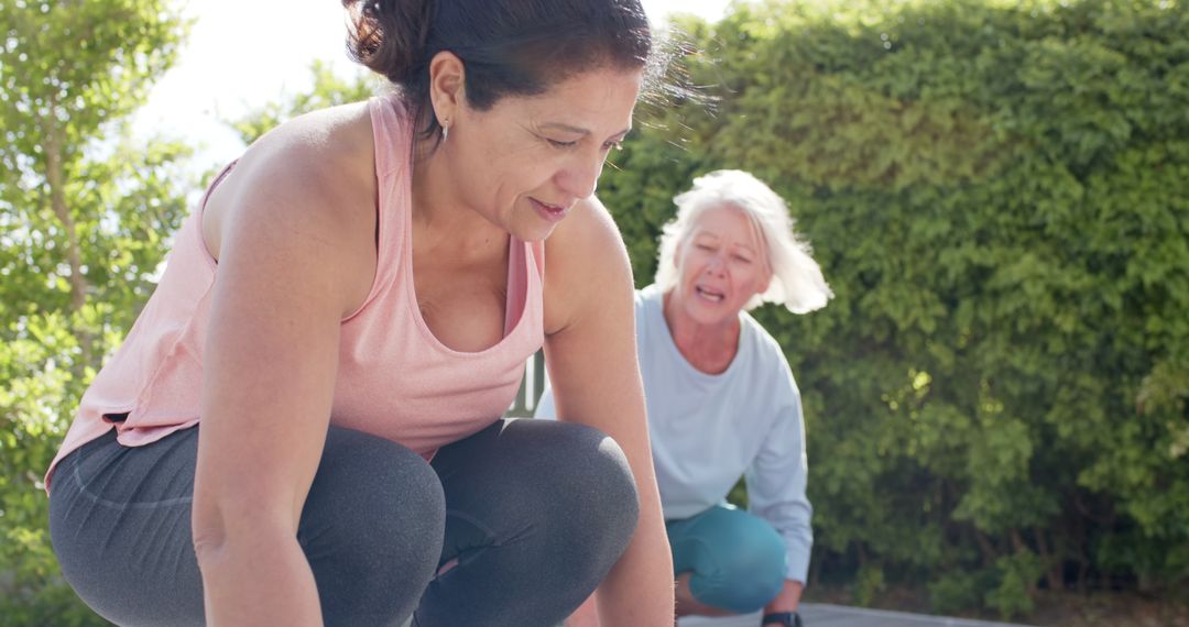 Middle-aged and Senior Women Exercising Together Outdoors - Free Images, Stock Photos and Pictures on Pikwizard.com