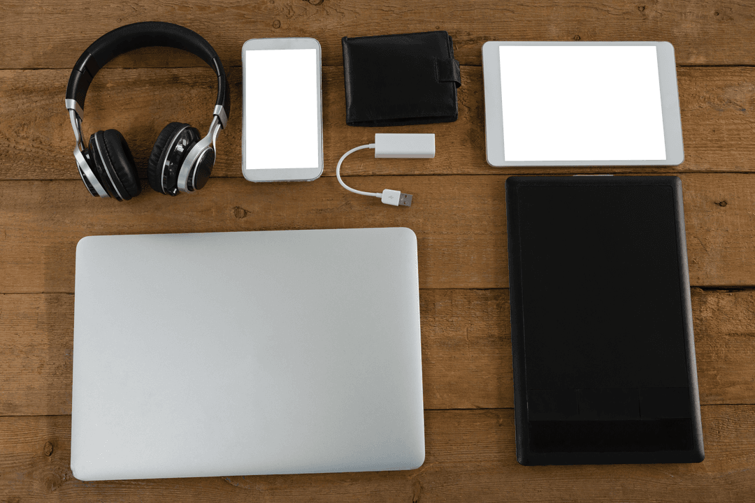 Transparent Selection of Modern Gadgets on Wooden Surface