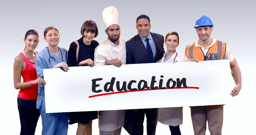Diverse Professionals Holding Education Sign - Free Images, Stock Photos and Pictures on Pikwizard.com