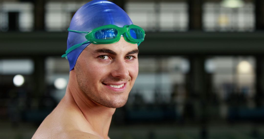 Male Swimmer Wearing Swim Cap and Goggles Smiling - Free Images, Stock Photos and Pictures on Pikwizard.com