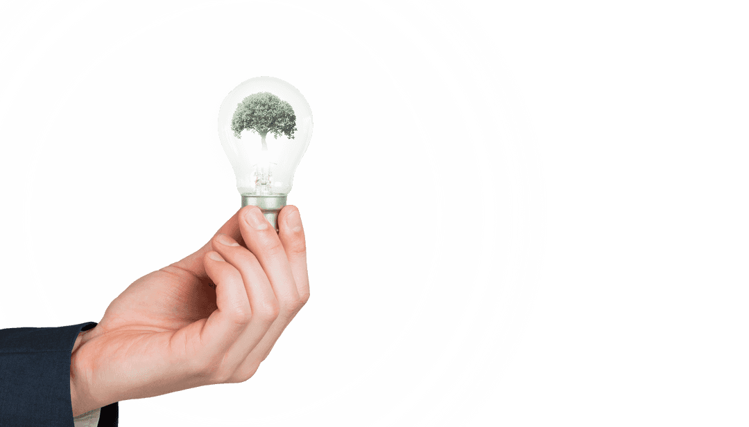 Transparent Hand Holding Eco-Friendly Light Bulb with Tree Inside