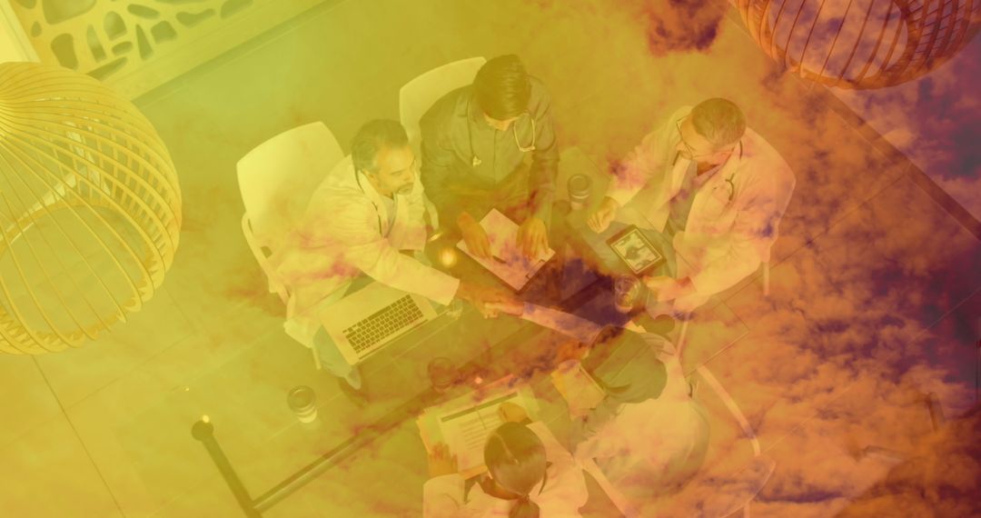 Medical Professionals Collaborating with Technology in Hospital Meeting