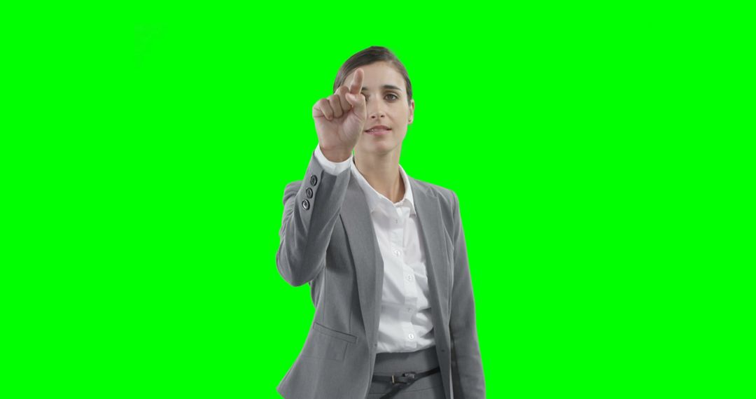 Businesswoman Interacting With Virtual Screen, Green Screen Background - Free Images, Stock Photos and Pictures on Pikwizard.com