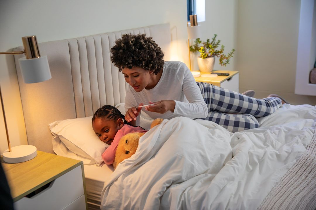 Mother Caring for Child in Bedroom with Love and Tenderness