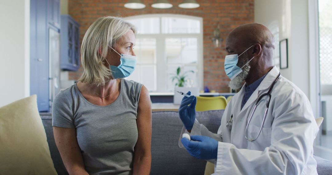 Mature Woman Consulting Doctor at Home During Pandemic - Free Images, Stock Photos and Pictures on Pikwizard.com