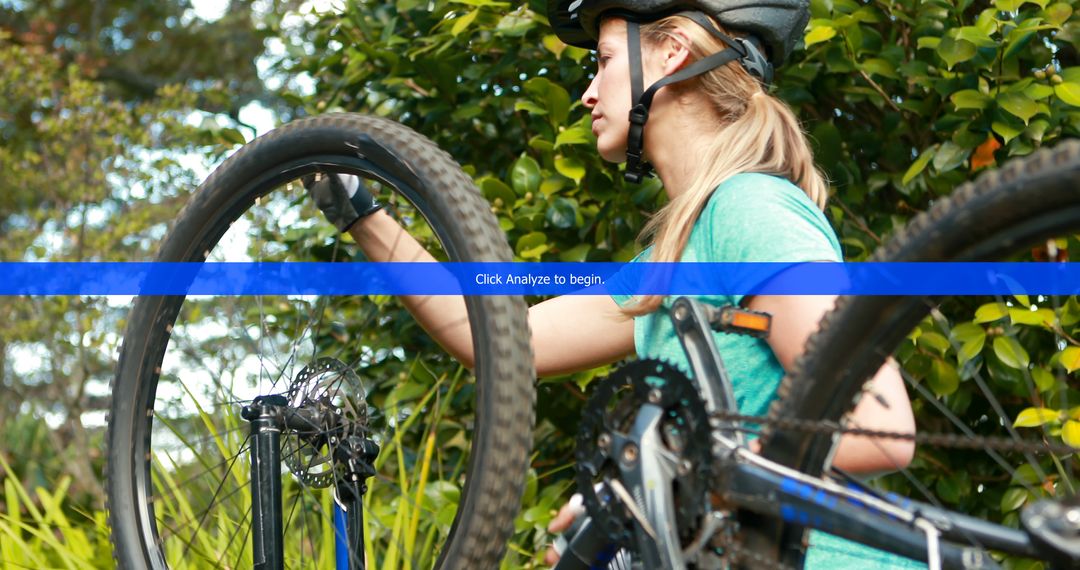 Woman fixing bicycle outdoors - Free Images, Stock Photos and Pictures on Pikwizard.com