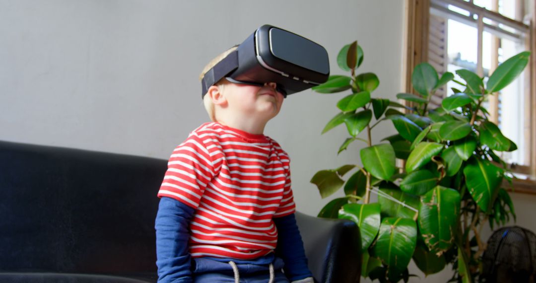 Young Boy Exploring Virtual Reality in Living Room Setting
