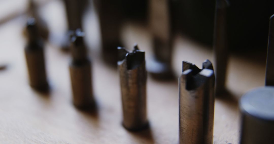 Close-Up of Industrial Drill Bits on Wooden Surface - Free Images, Stock Photos and Pictures on Pikwizard.com