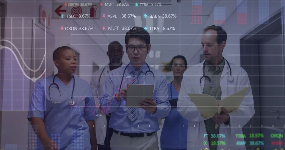 Diverse Medical Team Analyzing Reports with Digital Graphs