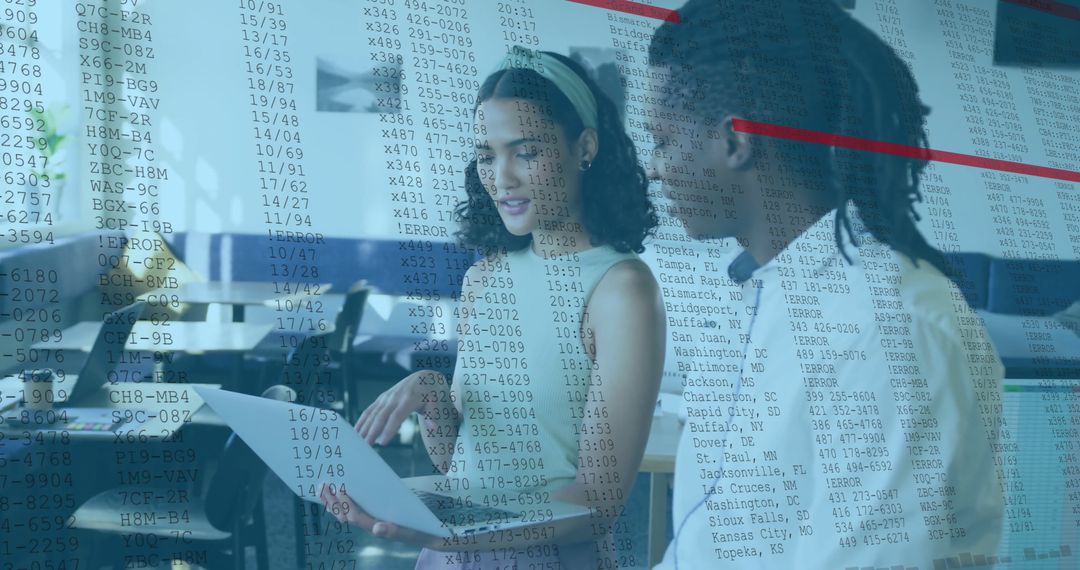 Diverse Business Team Analyzing Financial Data Together in Office