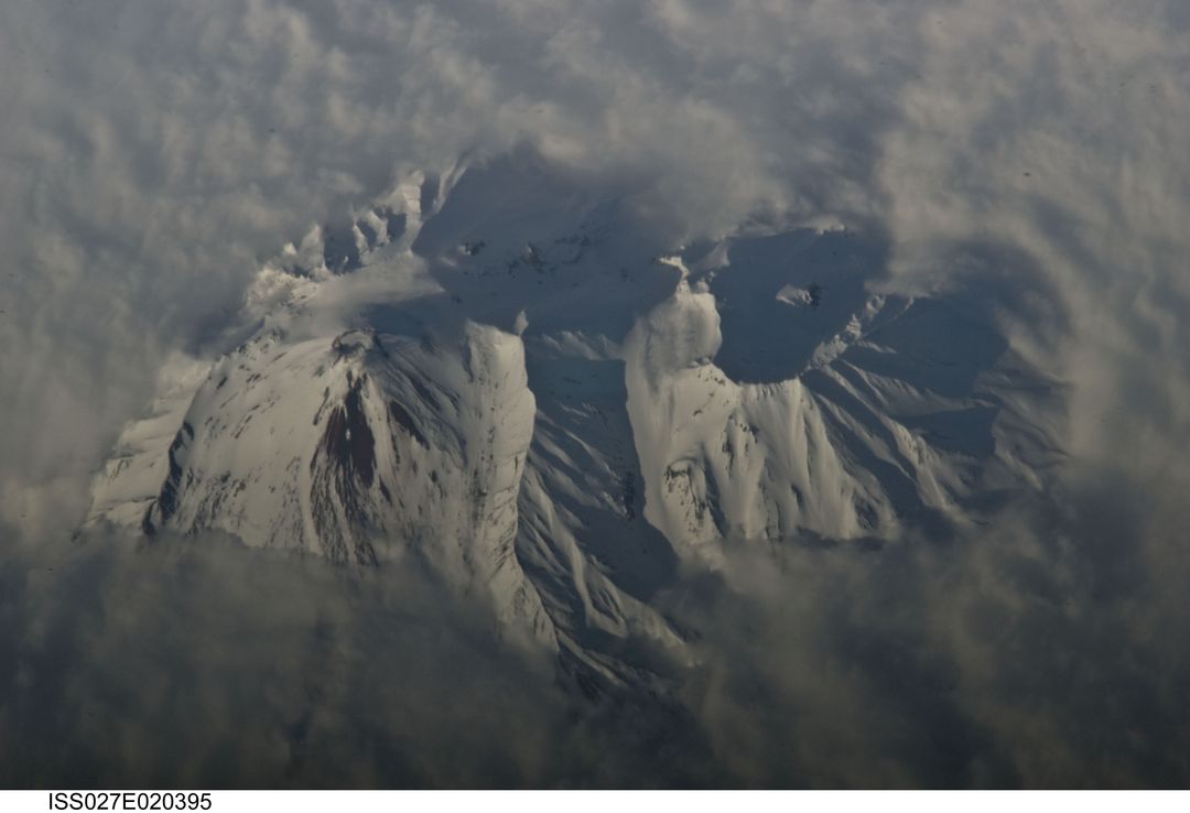 Aerial View of Snow-Covered Avachinsky Volcano on Kamchatka Peninsula - Free Images, Stock Photos and Pictures on Pikwizard.com