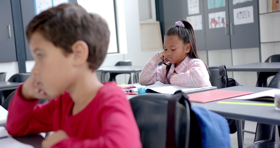 Children Concentrating on Lessons in Classroom Environment