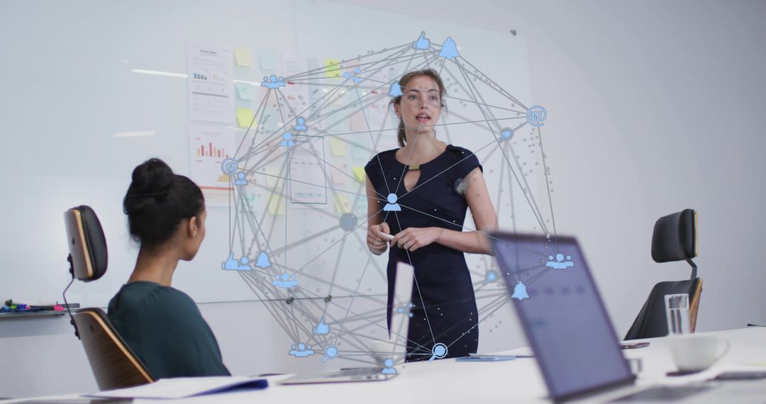 Businesswoman presenting digital network visualization in boardroom for strategy workshop